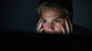 person with health anxiety googling symptoms